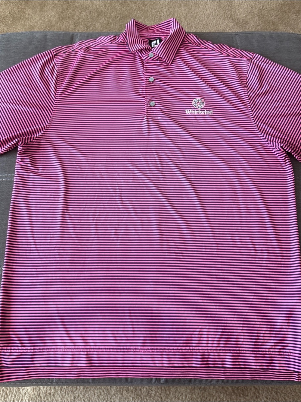 FootJoyman’s  Pink and black Striped Performance Polo. XL